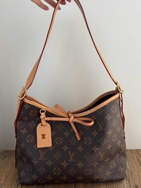 L V carry all handbag